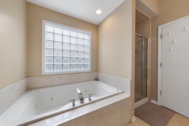 535 N Wood St, Chicago, IL 60622 - bathroom featuring tile patterned floors, a whirlpool tub, and a stall shower