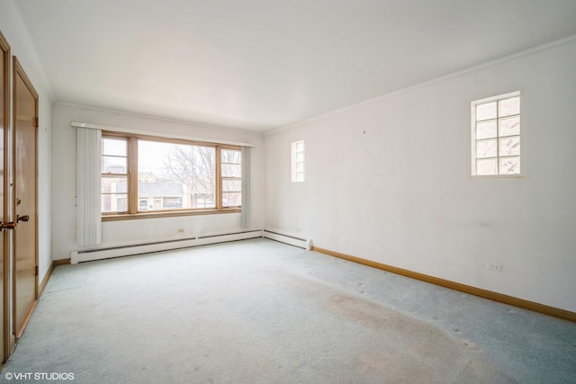 unfurnished room with baseboard heating, ornamental molding, and plenty of natural light