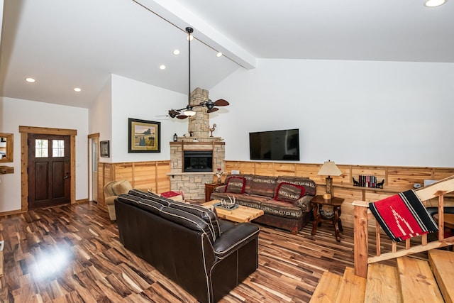 living area with a ceiling fan, beam ceiling, recessed lighting, and wood finished floors