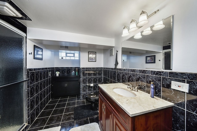 2N252 Diane Ave, Glen Ellyn, IL 60137 - bathroom with tile walls, tile patterned floors, vanity, a wainscoted wall, and toilet