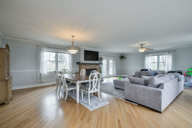 2N252 Diane Ave, Glen Ellyn, IL 60137 - dining area featuring healthy amount of natural light, a fireplace, light wood-type flooring, ornamental molding, and ceiling fan