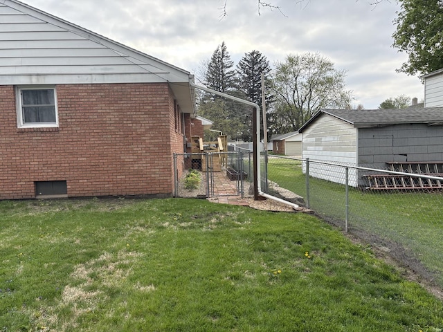 view of yard with a gate and fence