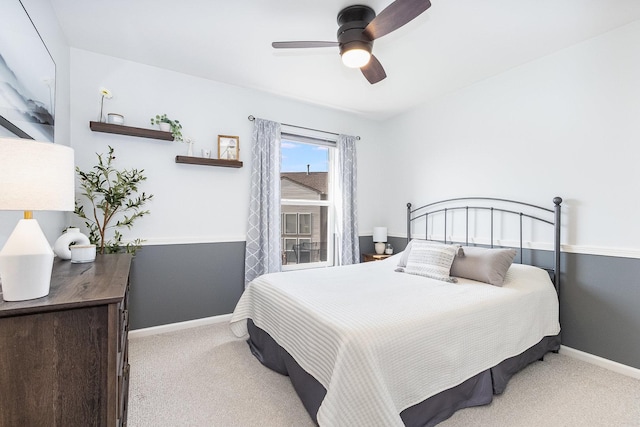 bedroom with carpet floors, a ceiling fan, and baseboards