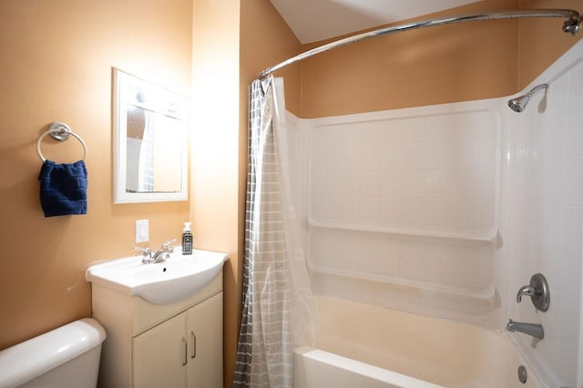 bathroom featuring shower / bath combo, toilet, and vanity