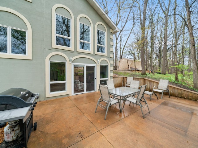 view of patio / terrace with area for grilling and outdoor dining space