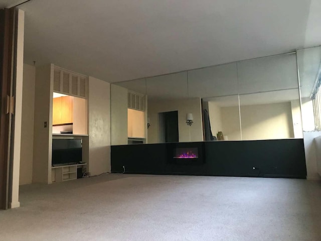 2800 N Lake Shore Dr Unit 613, Chicago, IL 60657 - unfurnished room featuring a lit fireplace