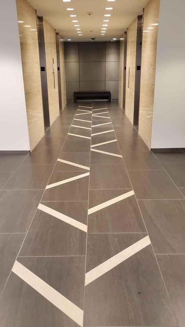 corridor featuring elevator