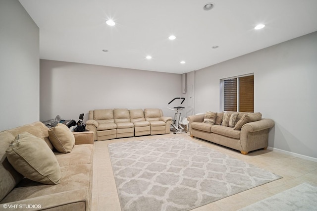 living room with recessed lighting and light tile patterned floors