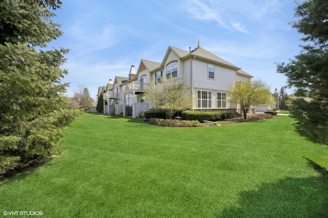view of home's exterior with a yard