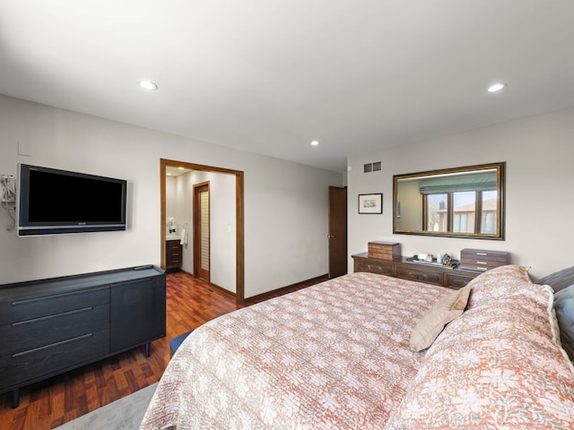 bedroom featuring dark wood-style floors, visible vents, and recessed lighting