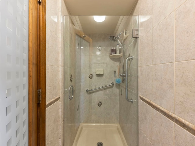 bathroom featuring a stall shower