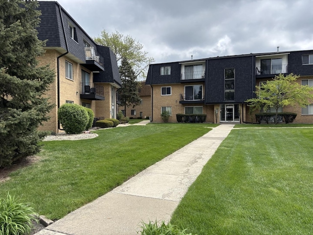 view of community with a yard