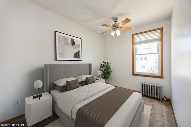 1309 Maple Ave, Berwyn, IL 60402 - carpeted bedroom with baseboards, ceiling fan, and radiator heating unit