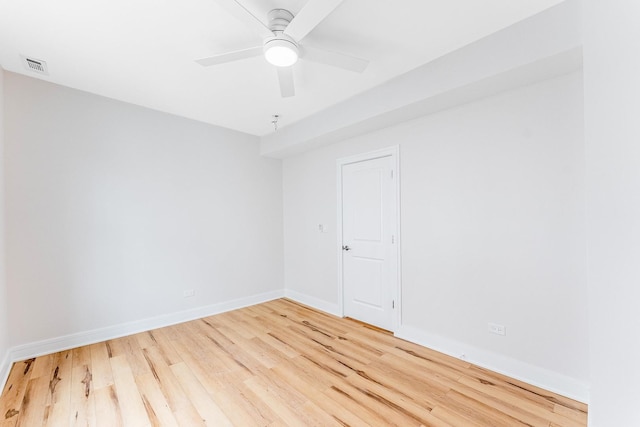 822 N Lockwood Ave, Chicago, IL 60651 - spare room with a ceiling fan, baseboards, visible vents, and light wood-style flooring