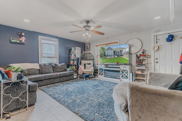 carpeted living room with recessed lighting and a ceiling fan