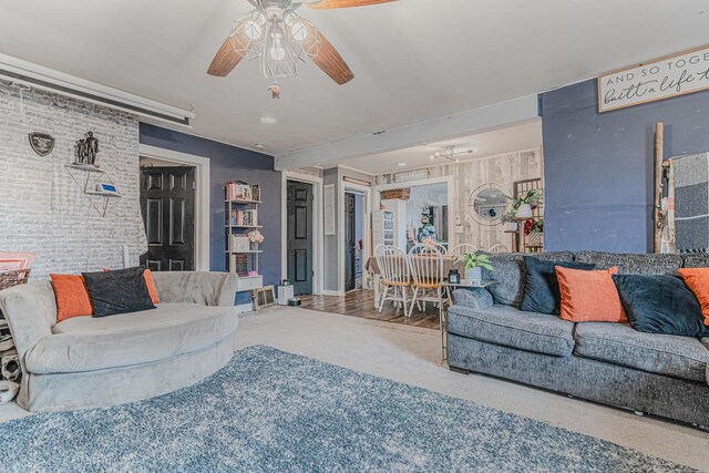 living room featuring a ceiling fan
