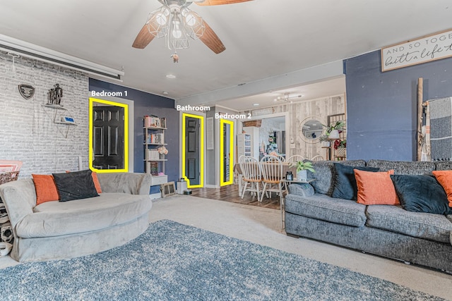 carpeted living area featuring ceiling fan