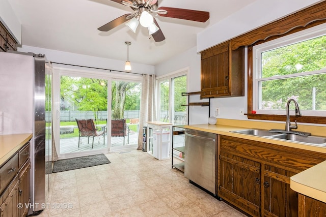 41W058 Colson Dr, Saint Charles, IL 60175 - kitchen with appliances with stainless steel finishes, a sink, healthy amount of natural light, and light countertops
