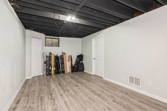 41W058 Colson Dr, Saint Charles, IL 60175 - finished below grade area featuring wood finished floors and baseboards