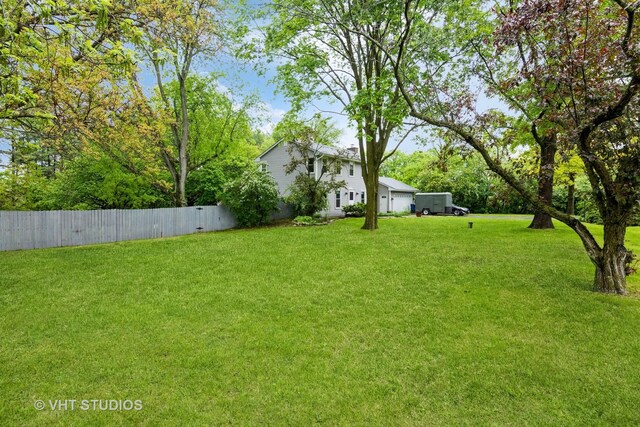 41W058 Colson Dr, Saint Charles, IL 60175 - view of yard with a garage