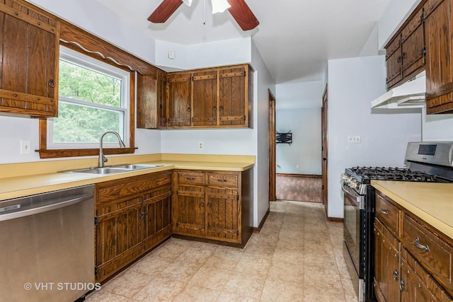 41W058 Colson Dr, Saint Charles, IL 60175 - kitchen with stainless steel appliances, a sink, under cabinet range hood, light countertops, and a ceiling fan