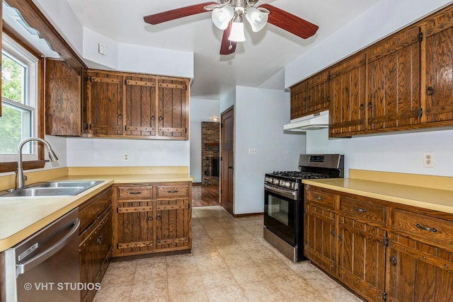 41W058 Colson Dr, Saint Charles, IL 60175 - kitchen featuring appliances with stainless steel finishes, a sink, under cabinet range hood, a ceiling fan, and light countertops