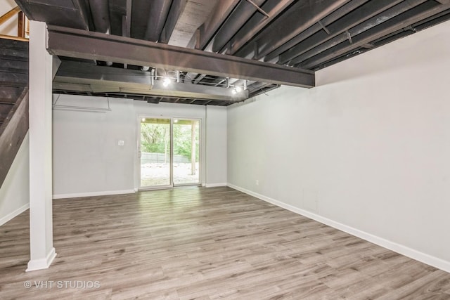 41W058 Colson Dr, Saint Charles, IL 60175 - below grade area featuring wood finished floors, baseboards, and stairs