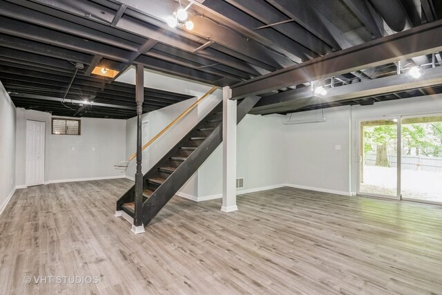 41W058 Colson Dr, Saint Charles, IL 60175 - basement with stairway, baseboards, and wood finished floors