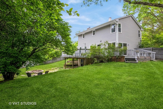 41W058 Colson Dr, Saint Charles, IL 60175 - back of house with a chimney and a wooden deck