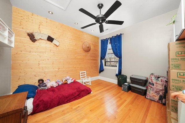 7633 N Greenview Ave Unit 3W, Chicago, IL 60626 - bedroom featuring recessed lighting, ceiling fan, wood walls, baseboards, and wood finished floors