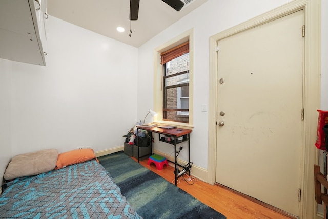 7633 N Greenview Ave Unit 3W, Chicago, IL 60626 - bedroom featuring baseboards, ceiling fan, and light wood-style floors