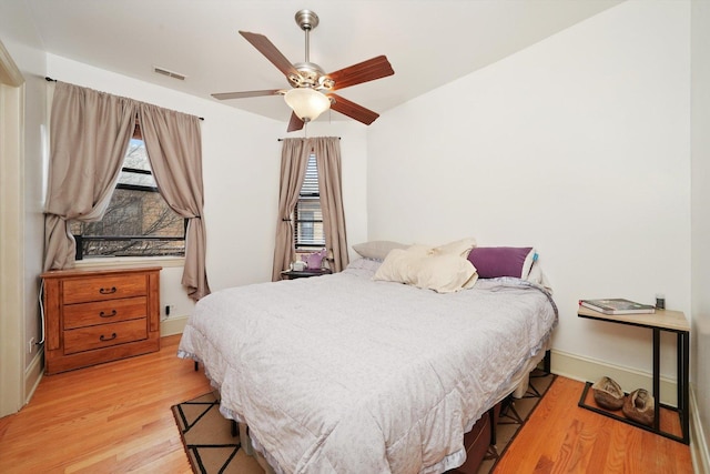 7633 N Greenview Ave Unit 3W, Chicago, IL 60626 - bedroom featuring a ceiling fan, visible vents, and wood finished floors