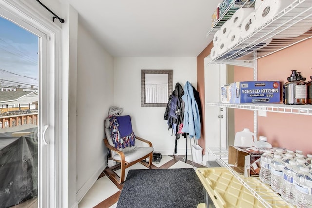 interior space with baseboards and plenty of natural light