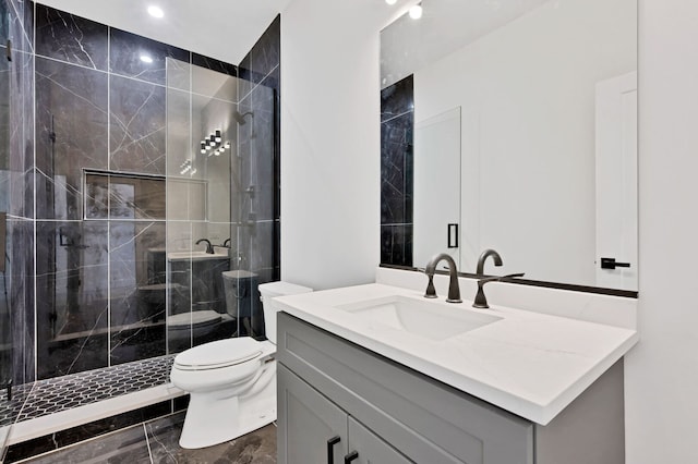 full bath featuring vanity, toilet, marble finish floor, recessed lighting, and a stall shower