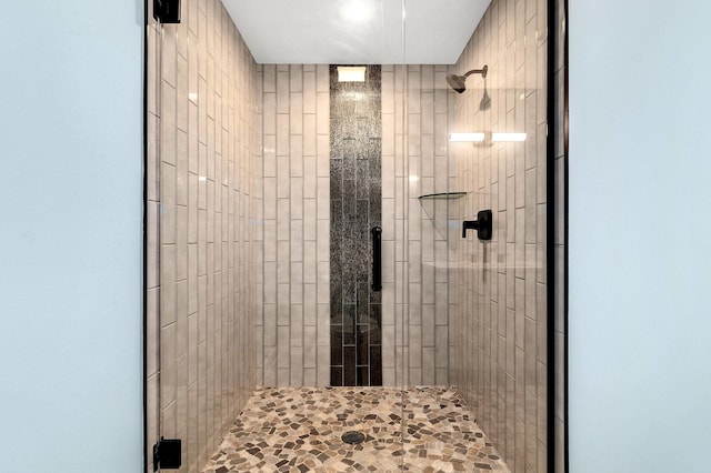 full bath with a stall shower and recessed lighting