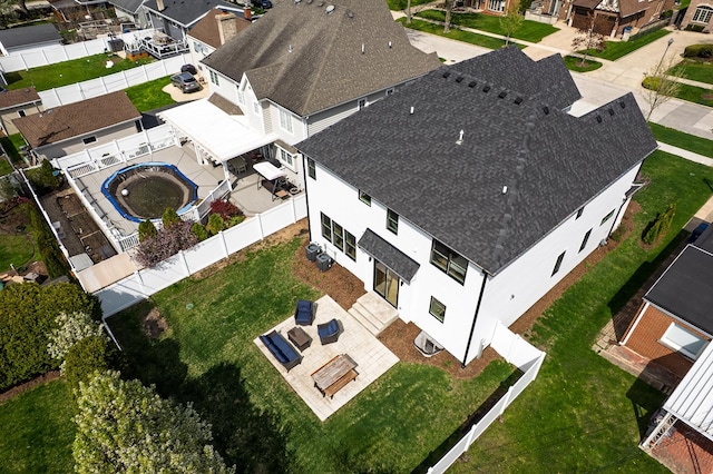 aerial view of residential area with a pool area