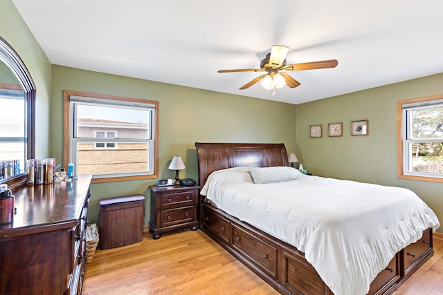 bedroom featuring a ceiling fan and light wood-style flooring