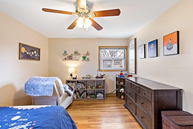 bedroom featuring ceiling fan and light wood finished floors