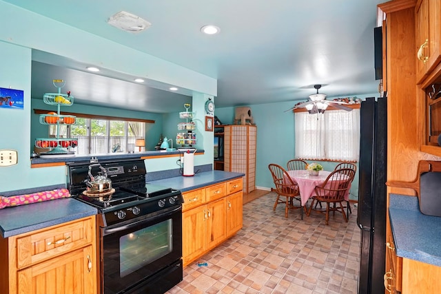 kitchen with recessed lighting, dark countertops, ceiling fan, and black appliances
