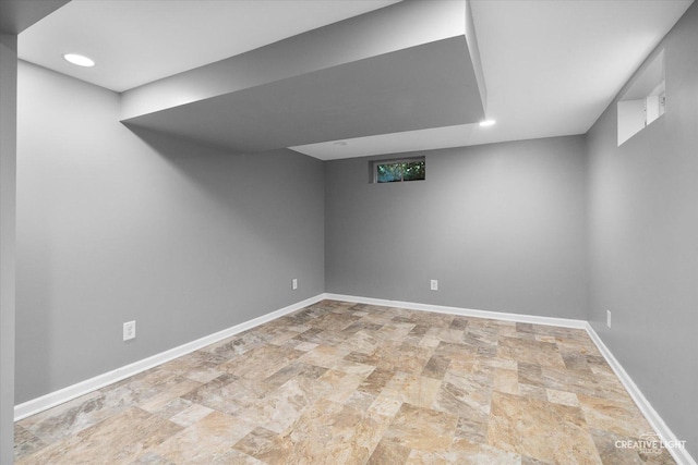 145 W Eisenhower St, Waterman, IL 60556 - finished basement featuring baseboards, recessed lighting, and stone finish floor