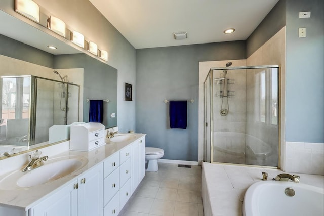 2502 S Hidden Trl, Spring Grove, IL 60081 - bathroom with a stall shower, tile patterned floors, and a sink