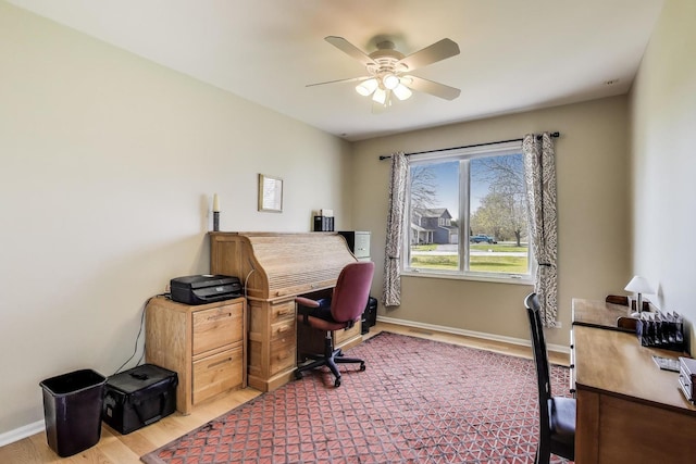 2502 S Hidden Trl, Spring Grove, IL 60081 - office featuring baseboards, a ceiling fan, and light wood-style floors