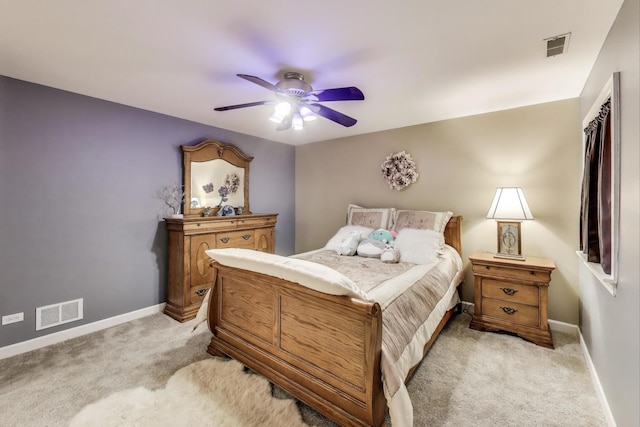 2502 S Hidden Trl, Spring Grove, IL 60081 - bedroom with visible vents, baseboards, ceiling fan, and light carpet