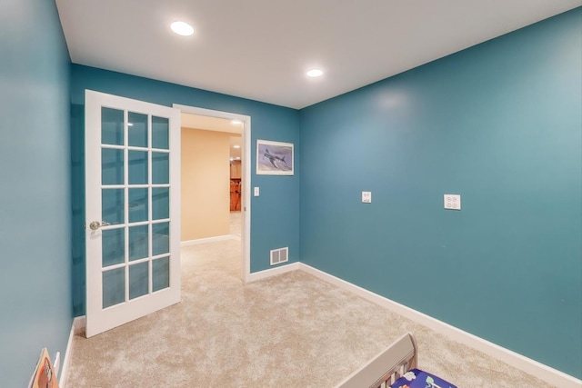 2502 S Hidden Trl, Spring Grove, IL 60081 - carpeted empty room with baseboards, visible vents, and recessed lighting