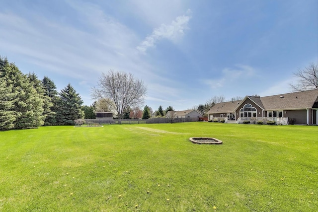 2502 S Hidden Trl, Spring Grove, IL 60081 - view of yard featuring fence and a fire pit