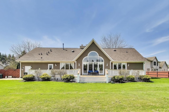 2502 S Hidden Trl, Spring Grove, IL 60081 - rear view of property with fence, a chimney, and a wooden deck