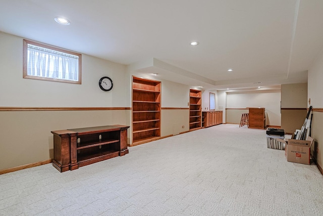 below grade area with recessed lighting, carpet flooring, and baseboards