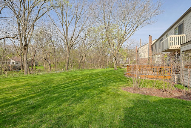 view of yard featuring a deck