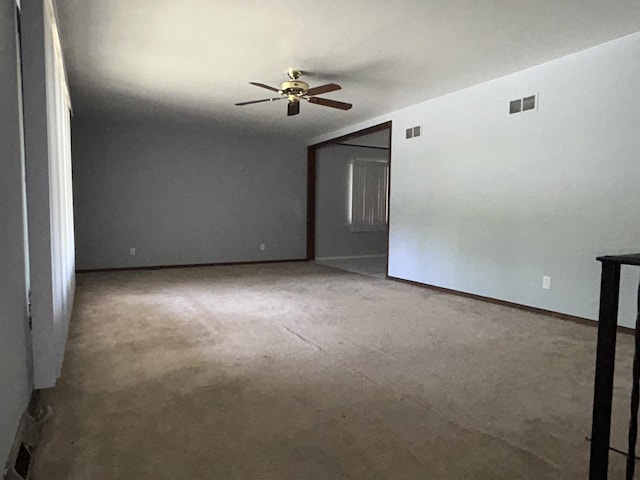 621 Superior Ave, Calumet City, IL 60409 - carpeted empty room with ceiling fan and baseboards