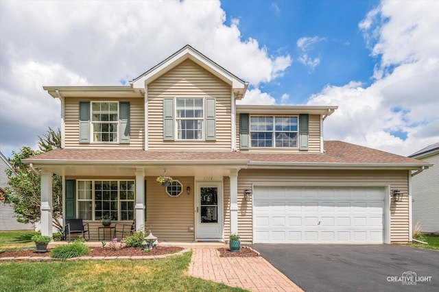 1118 Golden Oaks Pkwy, Aurora, IL 60506 - traditional-style home with covered porch, asphalt driveway, and a shingled roof